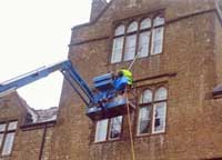 Window cleaning using elevated platform
